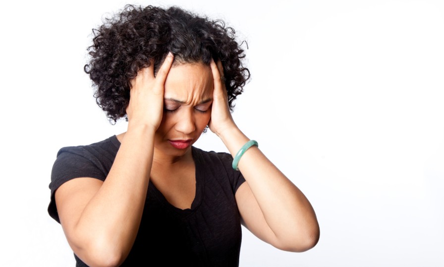 Cluttered desk with scattered papers